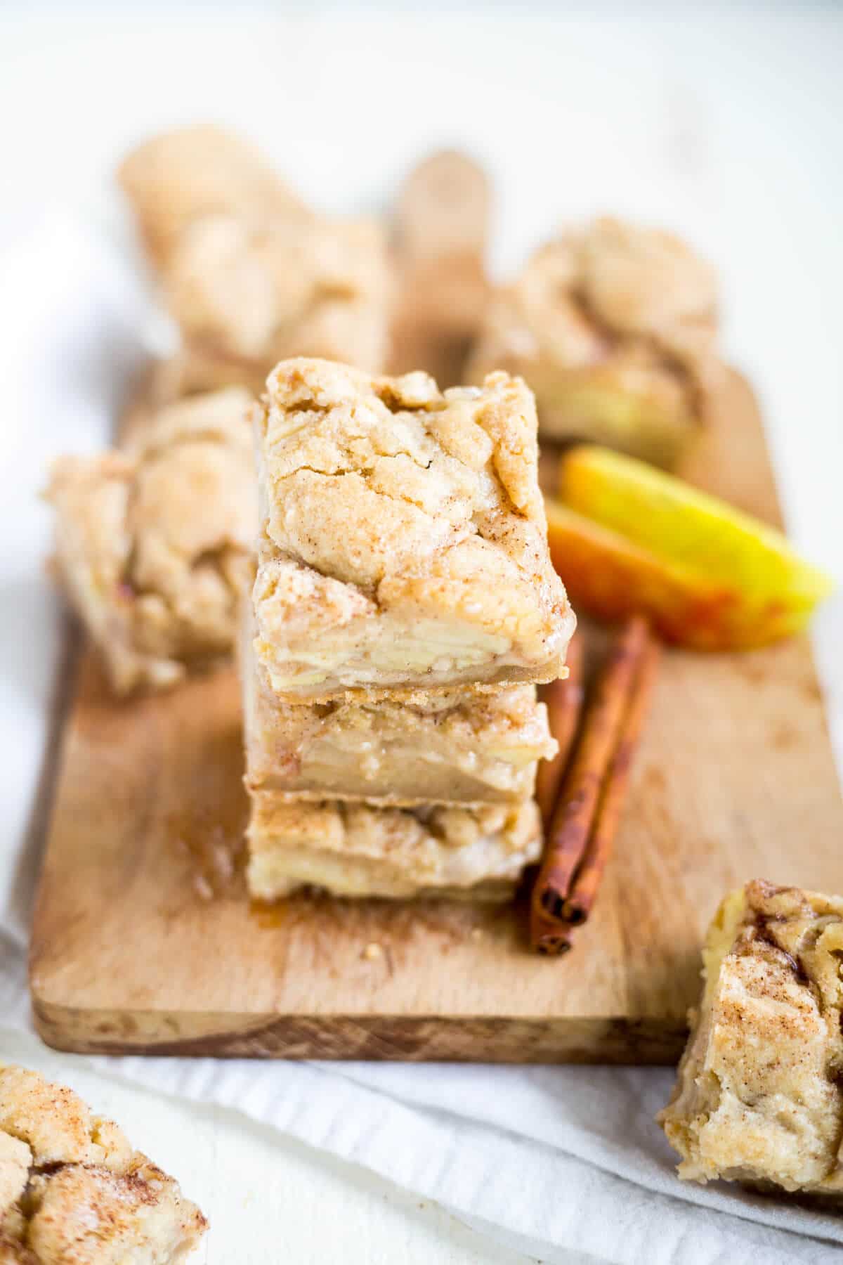 aerial view of a stack of three Sweet and gooey snickerdoodle apple pie bars