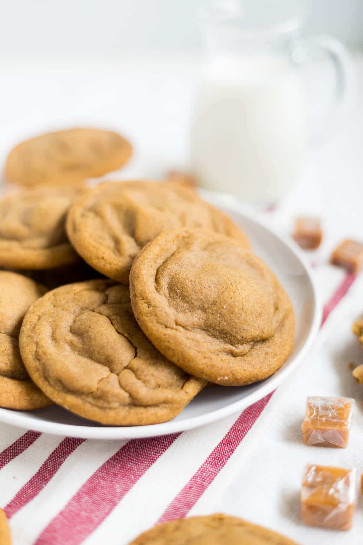 These soft and chewy ginger cookies are stuffed with a little salted caramel and baked to perfection. They're a great holiday recipe to add to your Christmas cookie collection.