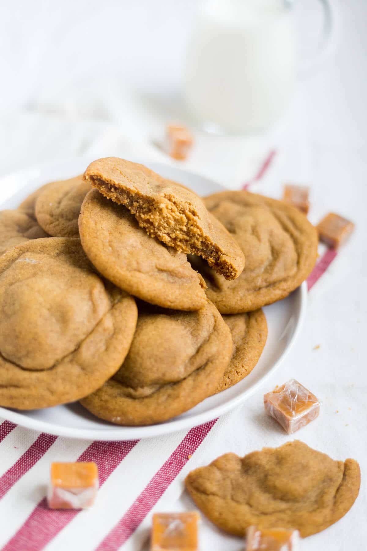 These soft and chewy ginger cookies are stuffed with a little salted caramel and baked to perfection. They're a great holiday recipe to add to your Christmas cookie collection.