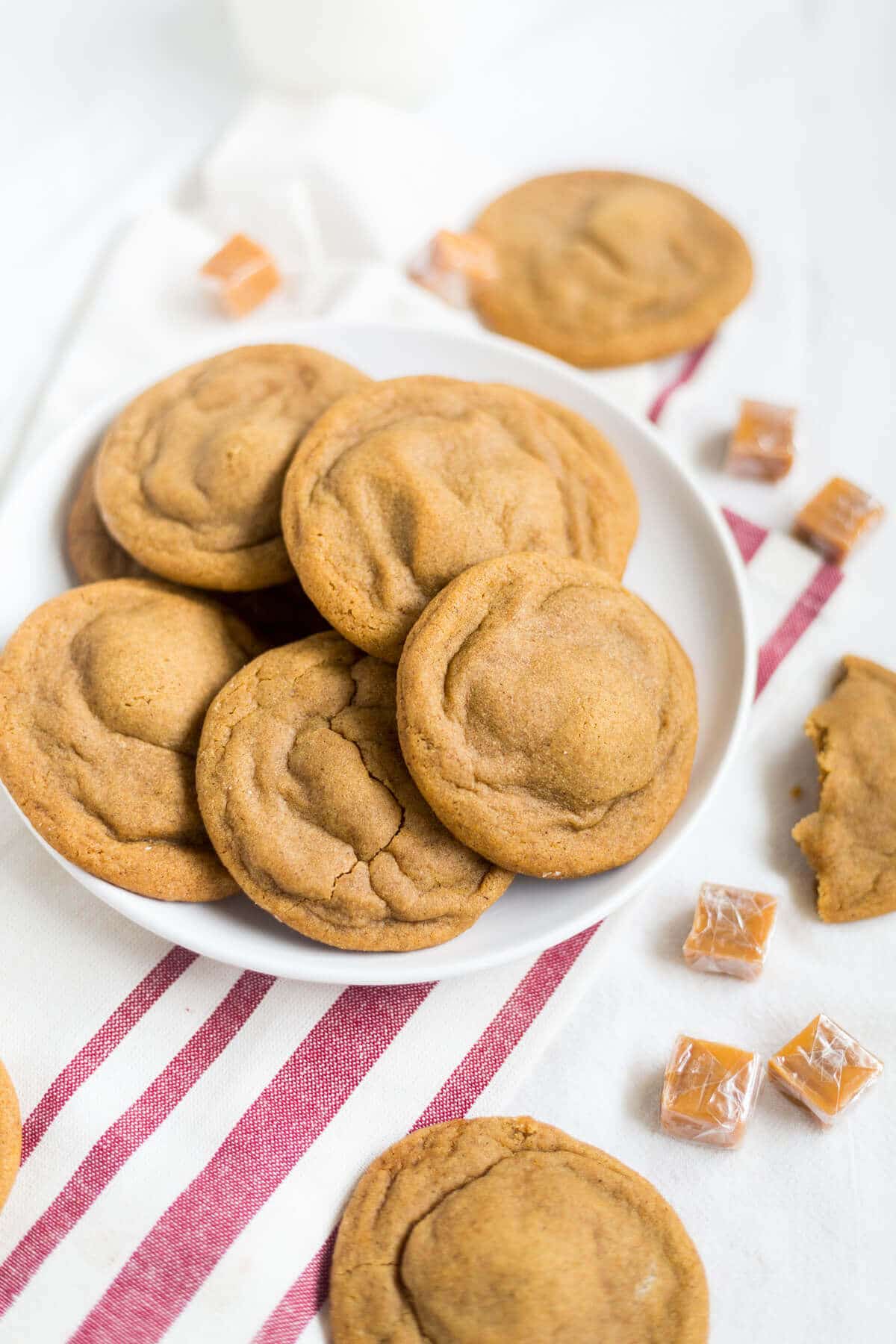 These soft and chewy ginger cookies are stuffed with a little salted caramel and baked to perfection. They're a great holiday recipe to add to your Christmas cookie collection.