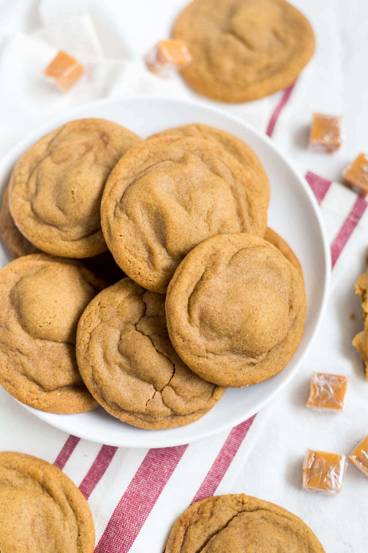 These soft and chewy ginger cookies are stuffed with a little salted caramel and baked to perfection. They're a great holiday recipe to add to your Christmas cookie collection.