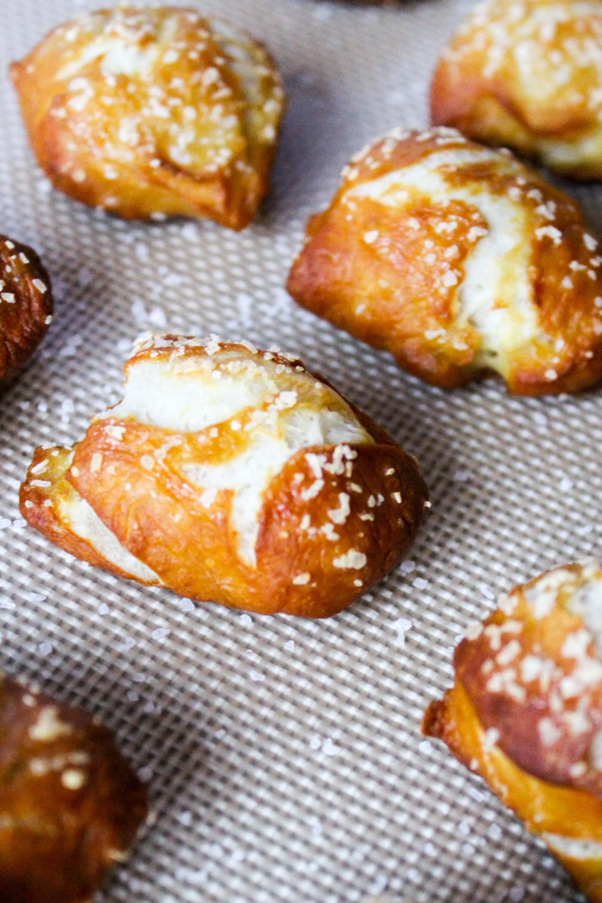 Beer cheese dip with soft pretzel bites are salty soft pretzel bites. This beer cheese dip is made with Tecate Light and it's so creamy and flavorful! This is the perfect recipe for parties and entertaining!