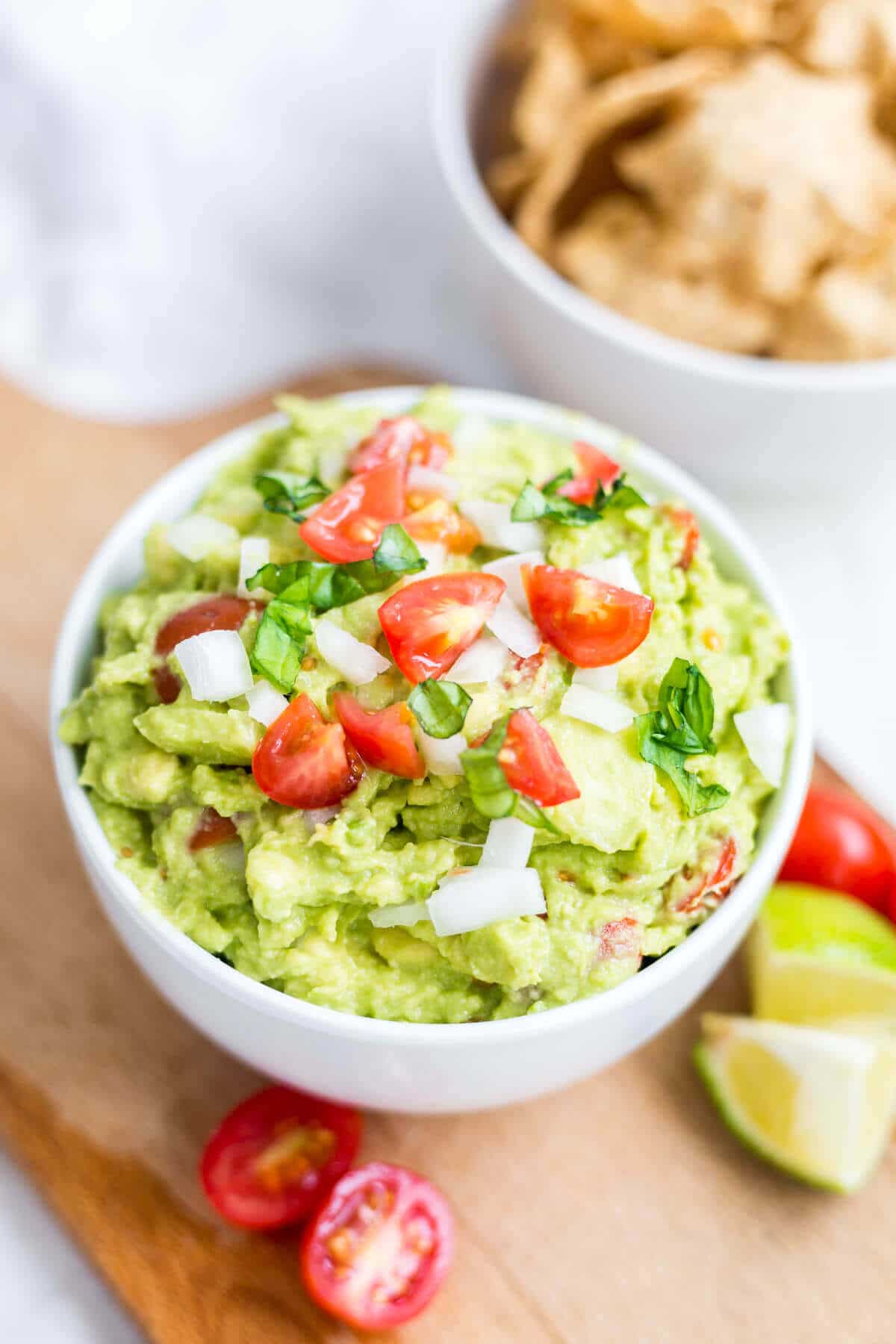 healthy guacamole in a white bowl