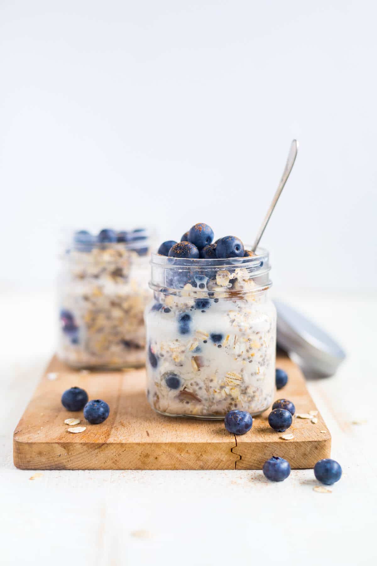 overnight oats with blueberries in a cup