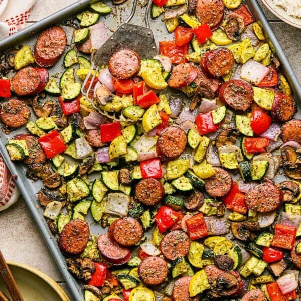 roasted sausage and veggies on a sheet pan.