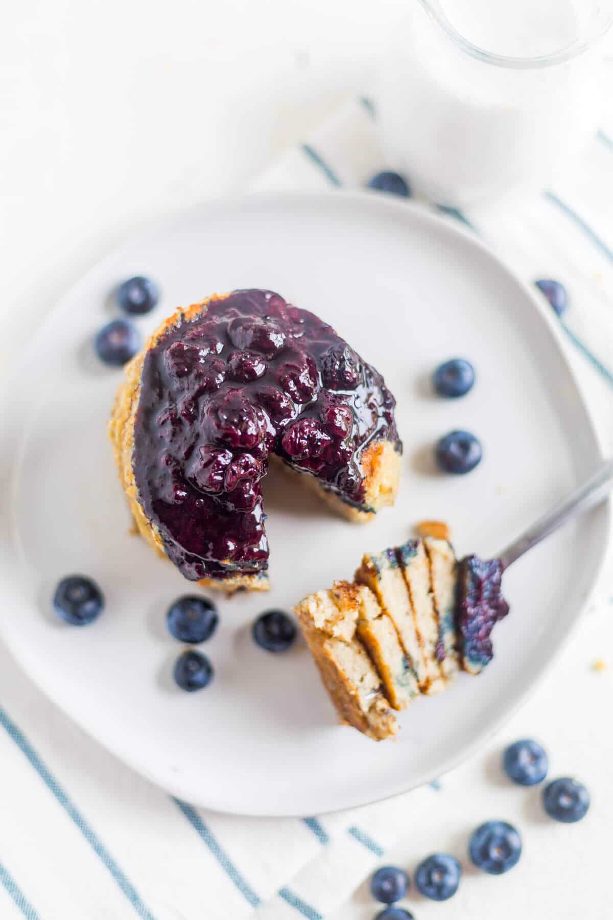 Coconut flour pancakes are an easy and healthy breakfast recipe. These pancakes with coconut flour are made with bananas, coconut oil and almond milk so they're clean and paleo!