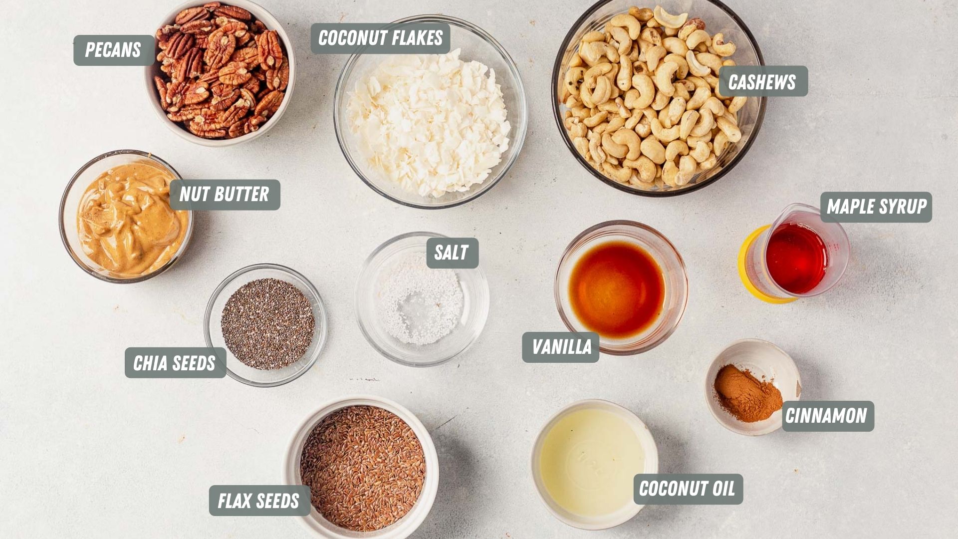 grain free granola ingredients measured out on a white table