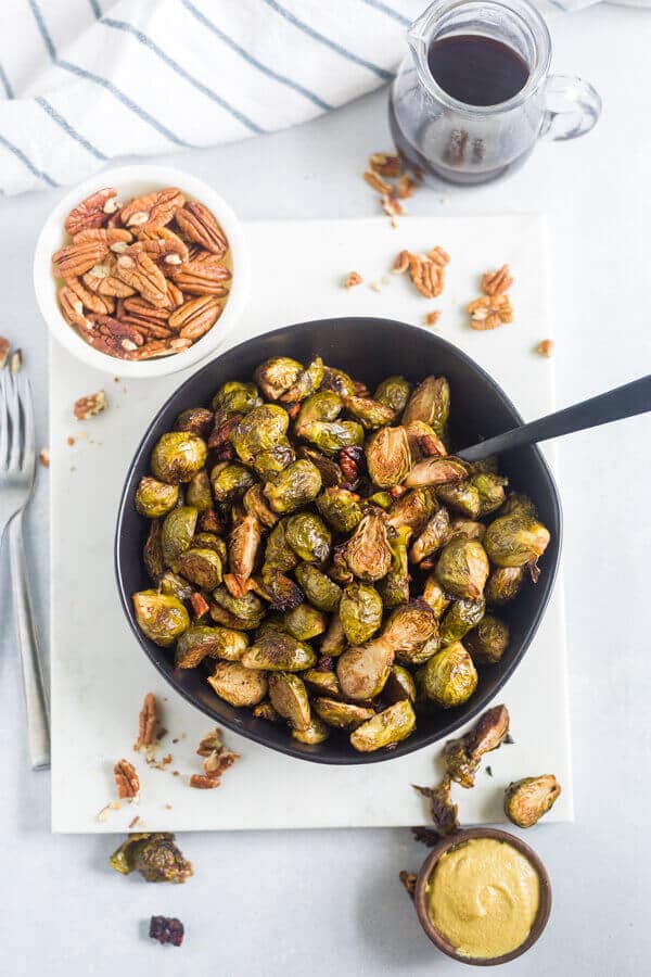 healthy anti inflammatory recipe for brussels sprouts in a black serving bowl