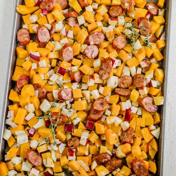 butternut squash sausage and apples roasted on a sheet pan
