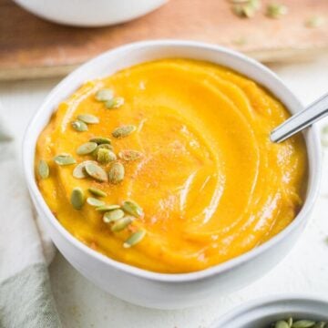 healthy butternut squash recipe in a bowl with a spoon