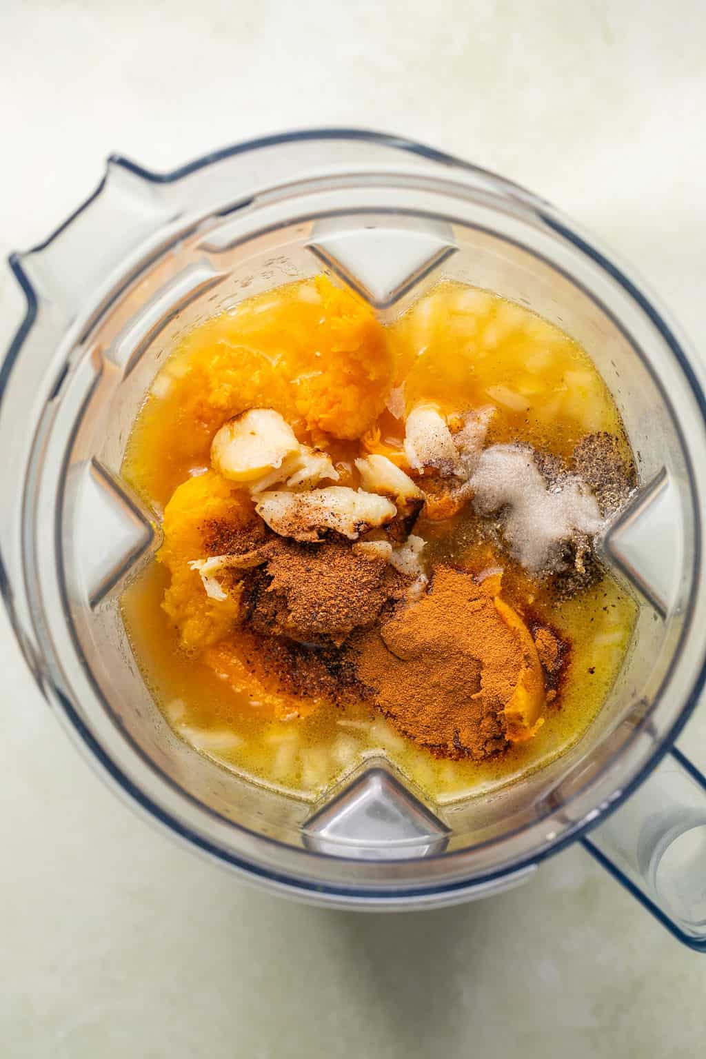 roasted butternut squash soup ingredients in a high speed blender.