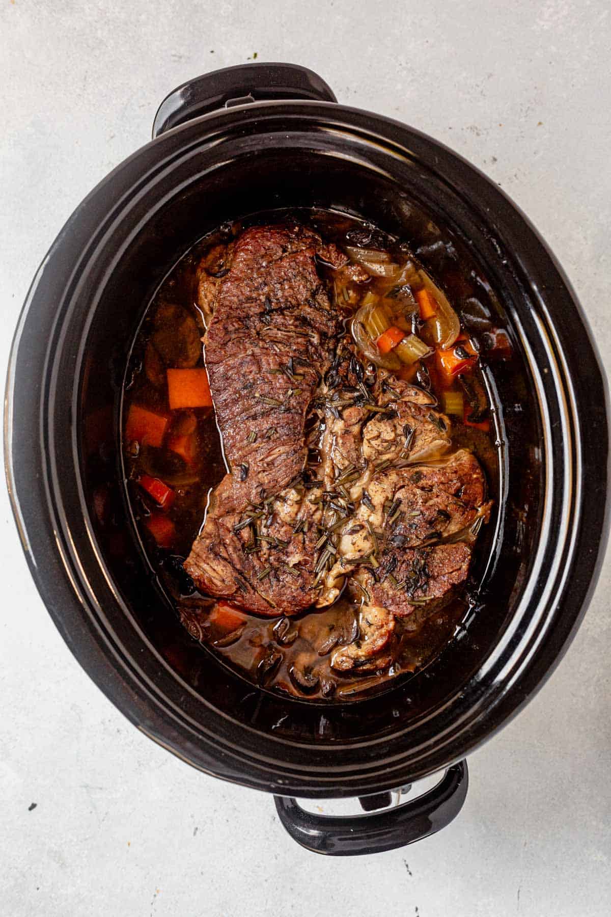 Slow cooker sweet potato beef stew after cooking in the crock pot.