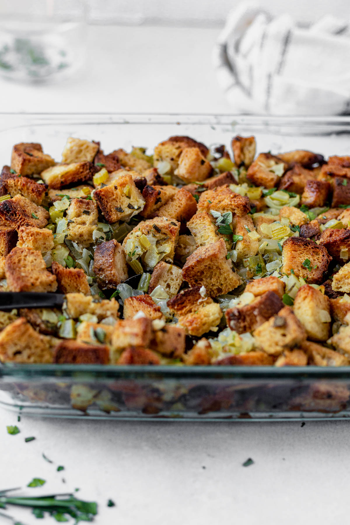 gluten free stuffing cooked golden brown in a casserole dish