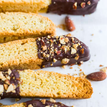 almond biscotti recipe dipped in chocolate and sprinkled with crushed almond