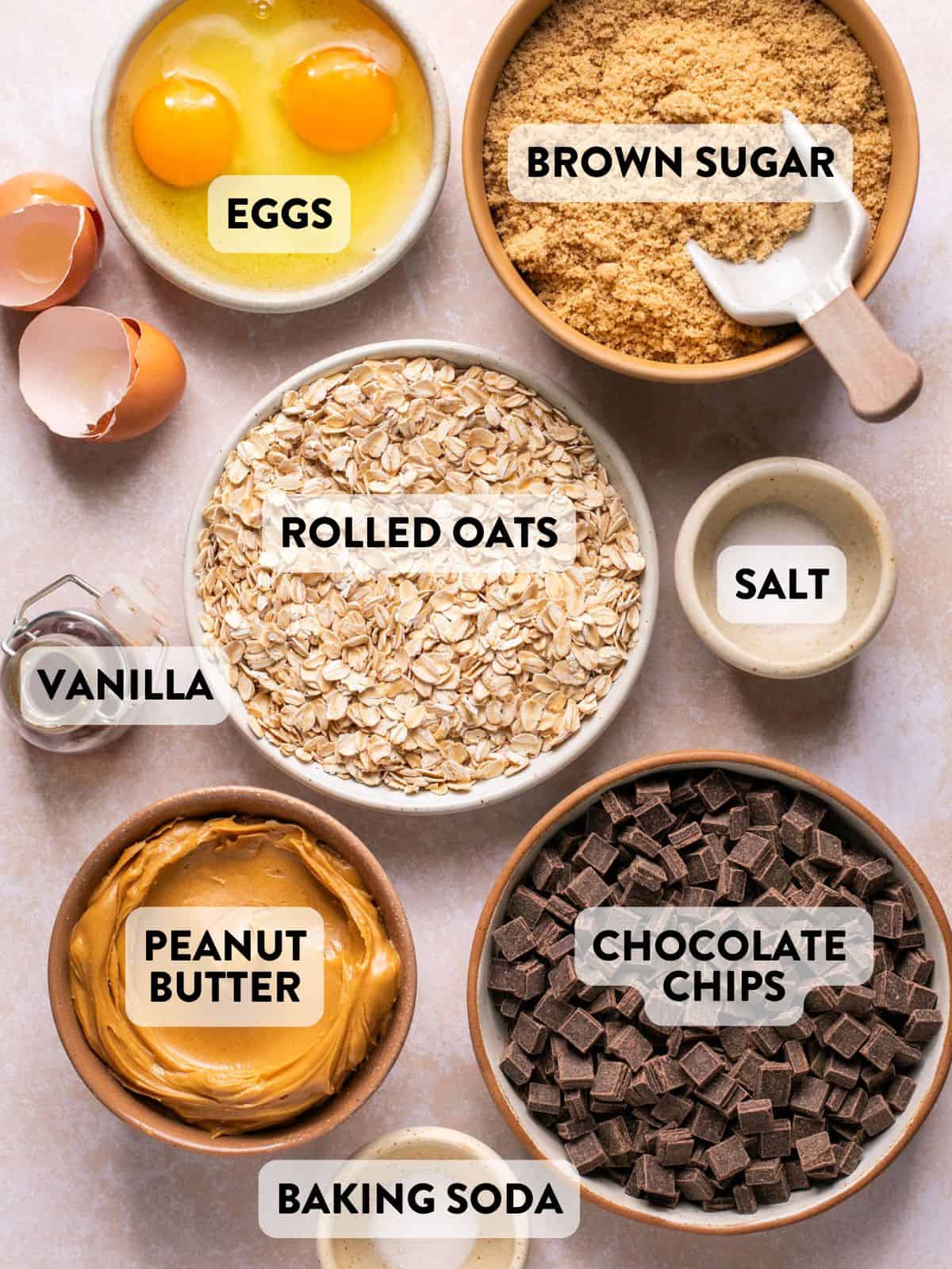 ingredients for flourless oatmeal chocolate chip cookies on a counter.