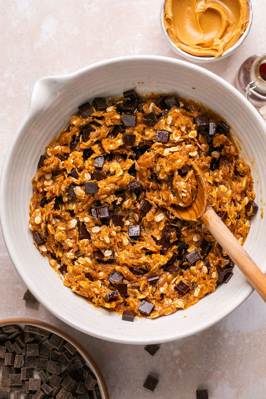 flourless peanut butter oatmeal chocolate chip cookie dough after chilling in a bowl.