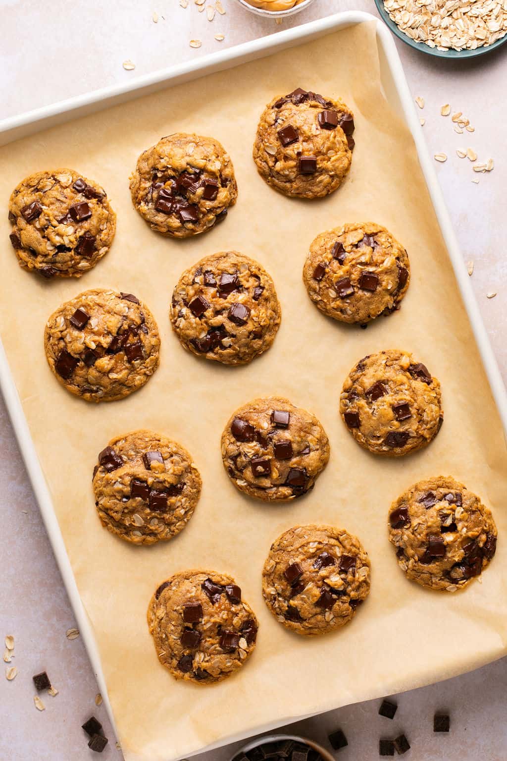 fresh baked flourless oatmeal peanut butter cookies on a baking sheet.