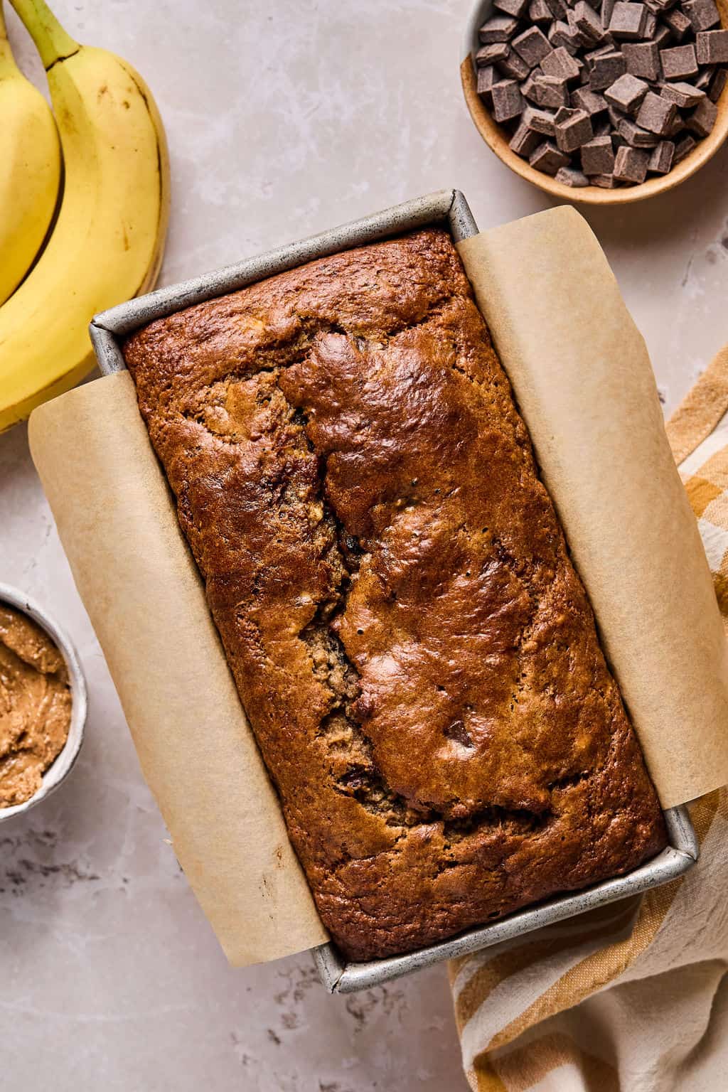 freshly baked paleo banana bread in a bread pan.