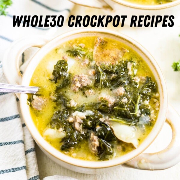 healthy zuppa toscana in a bowl with text that says "whole30 crockpot recipes" above it