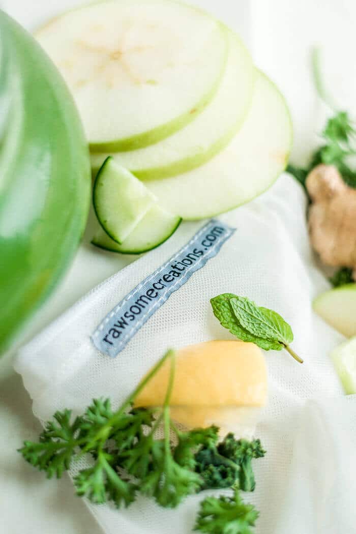 ingredients for green juice with a nut milk bag