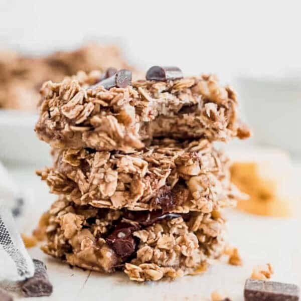 a stack of healthy banana oatmeal cookies on the counter