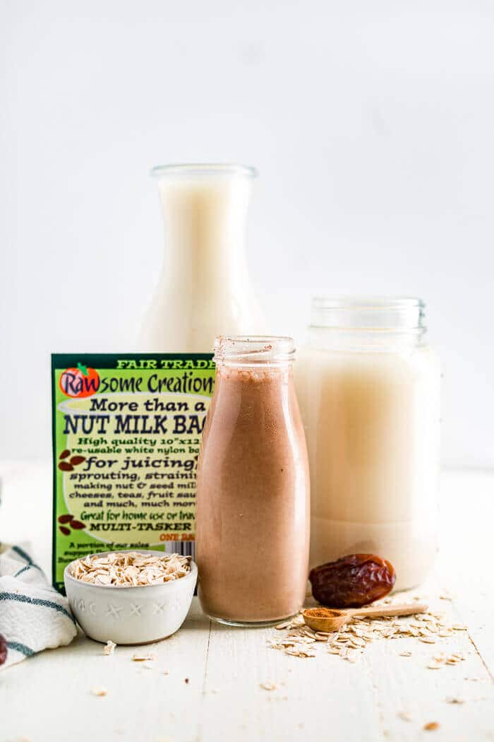 oat milk, chocolate oat milk and a nut milk bag 