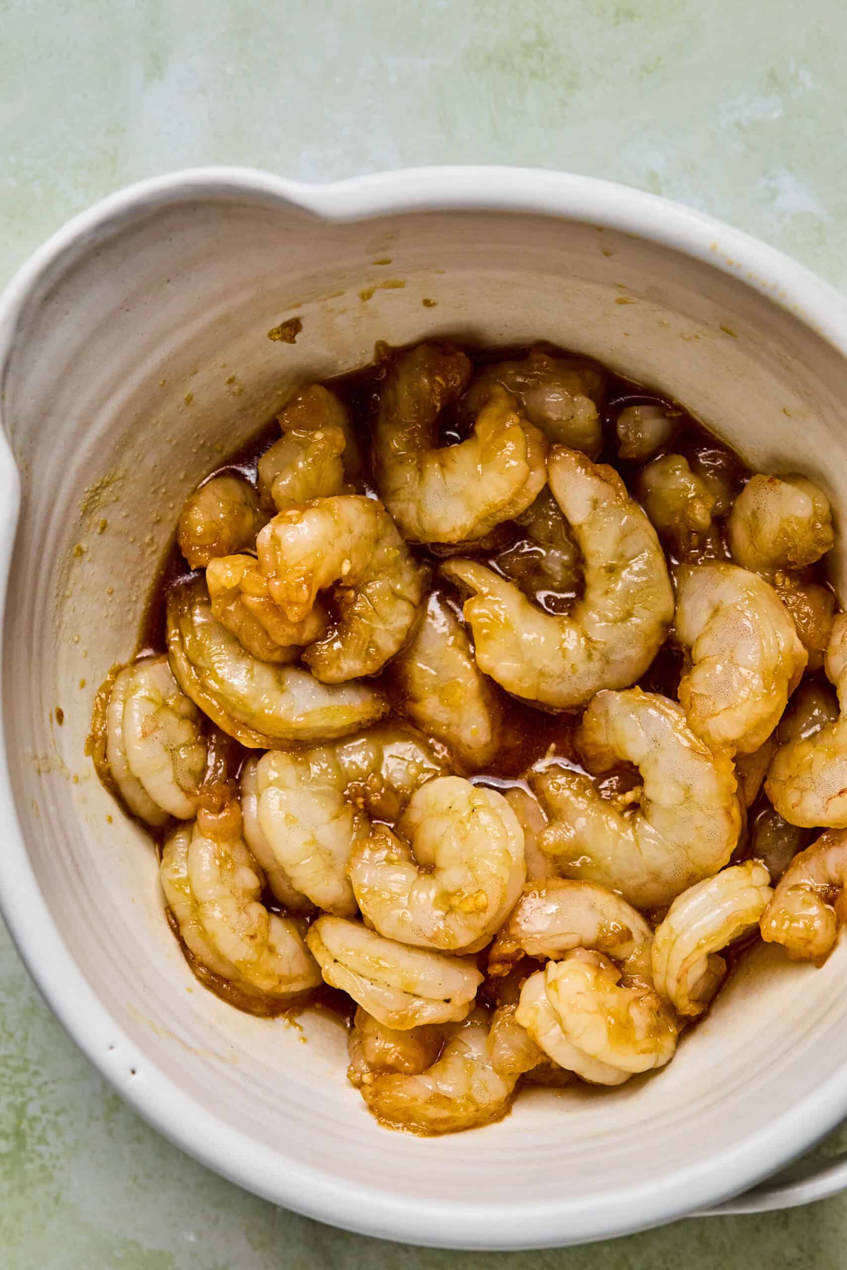 shrimp marinading in a honey garlic soy sauce.