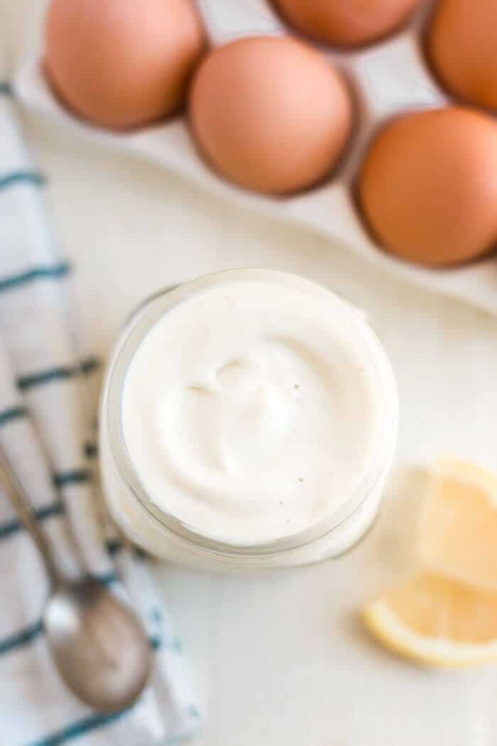 top view of paleo mayo recipe with eggs and lemon juice
