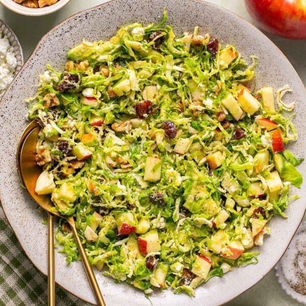 shaved brussel sprout salad in a sering bowl