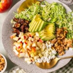brussel sprout salad ingredients in a bowl