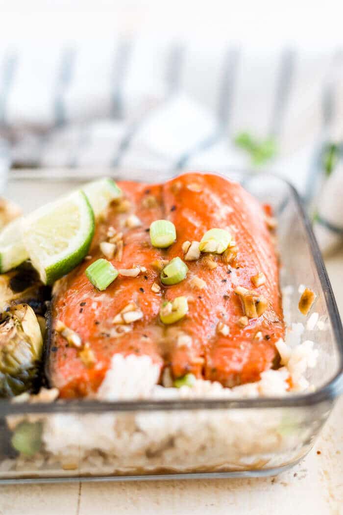 meal prep honey glazed salmon baked with white rice, brussels sprouts and green onion