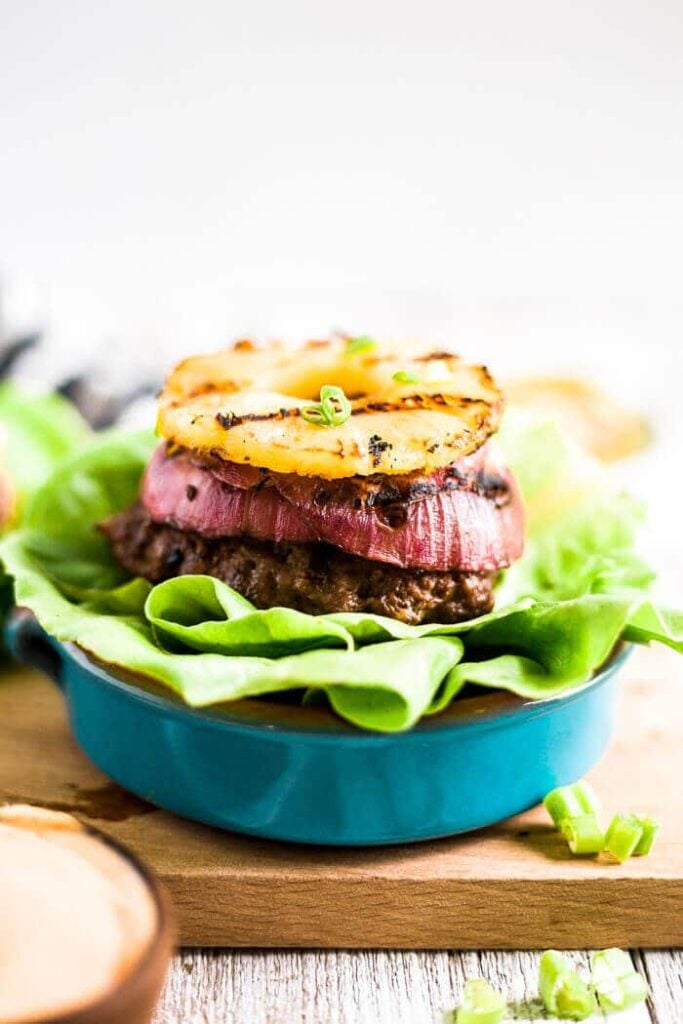 hawaiian teriyaki burgers on a bed of lettuce