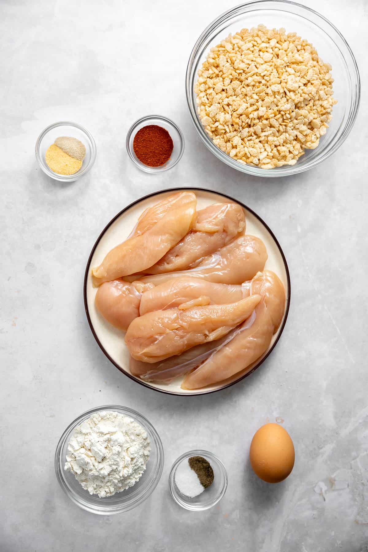 ingredients for rice krispie chicken on a counter.