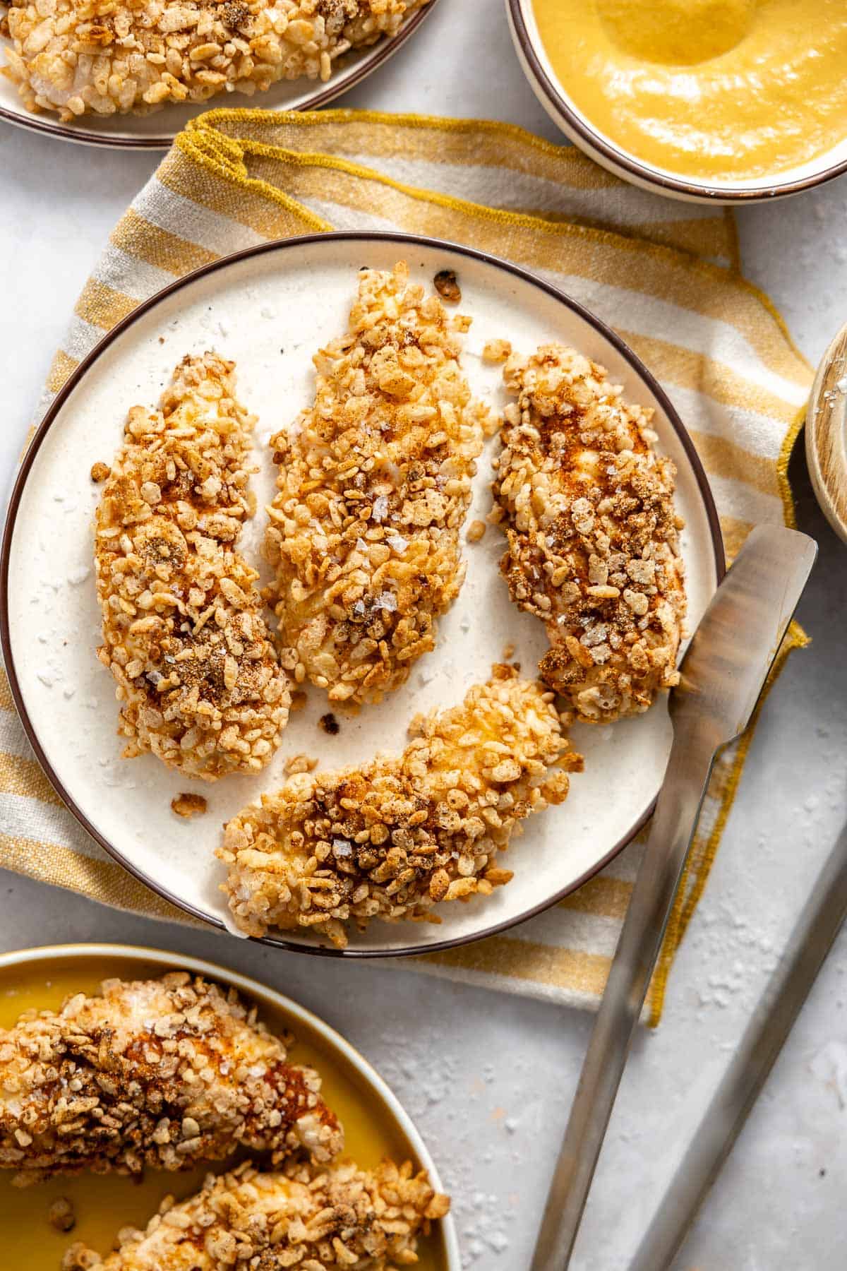 baked rice krispie chicken on a plate.