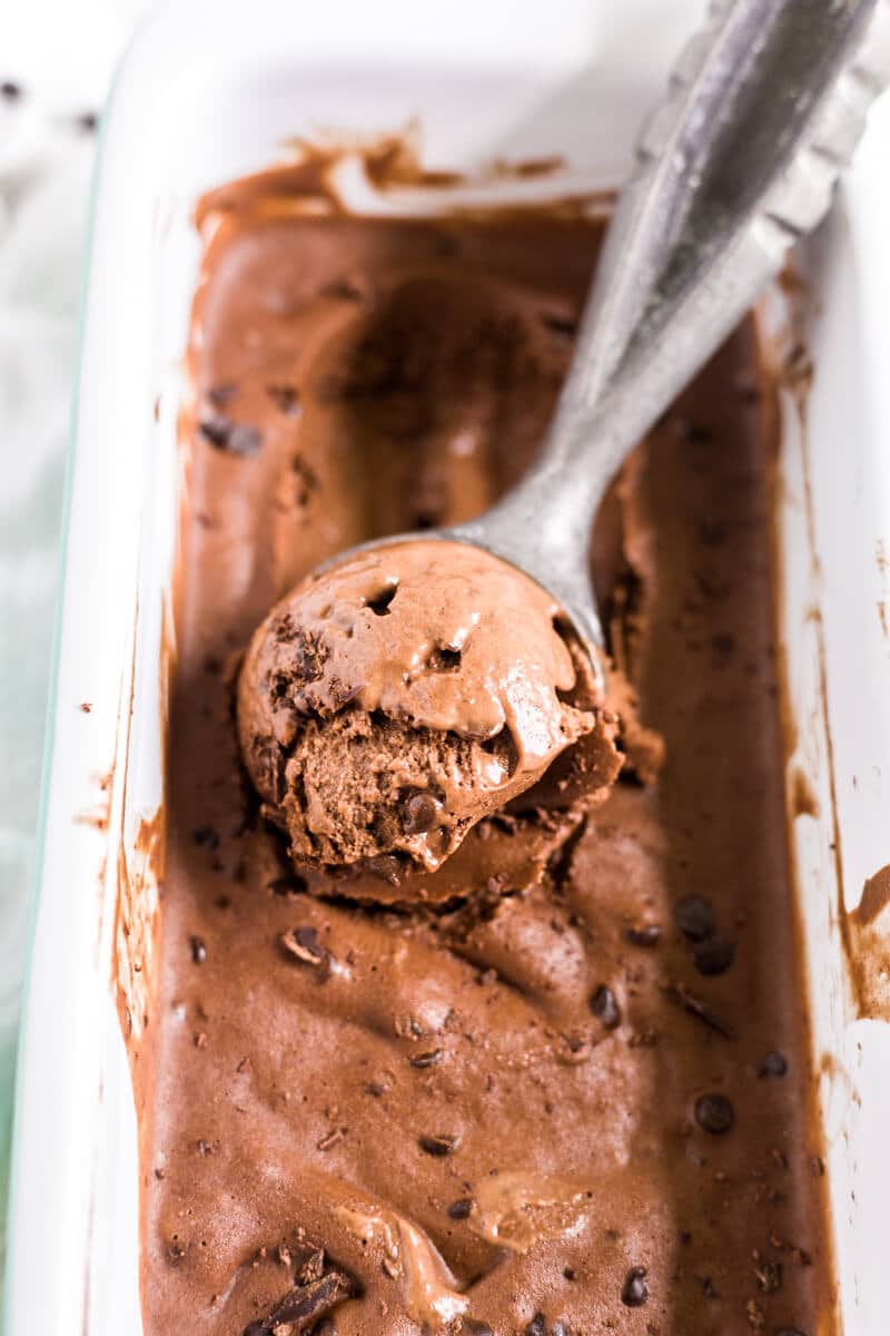a scoop of banana chocolate ice cream in a dish