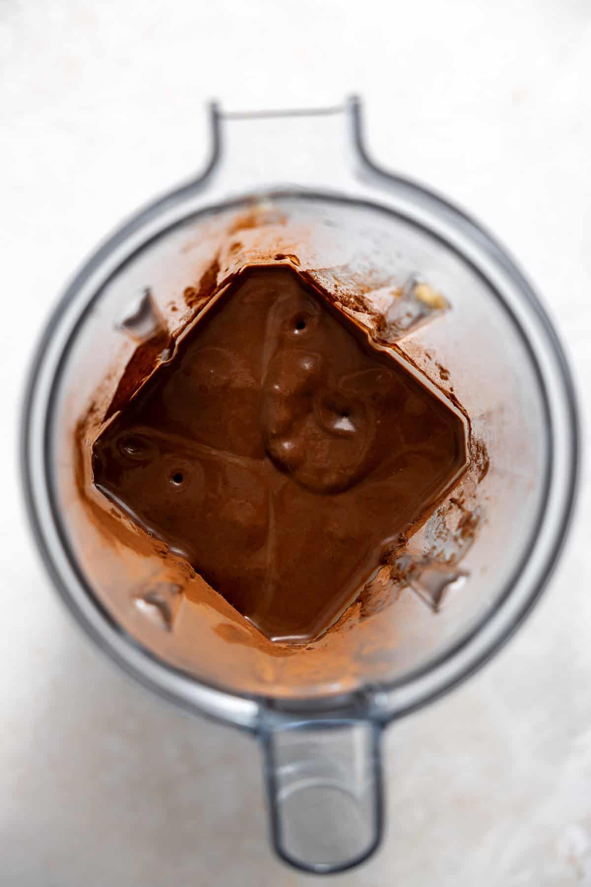 healthy 3 ingredient chocolate banana ice cream blended in a vitamix.