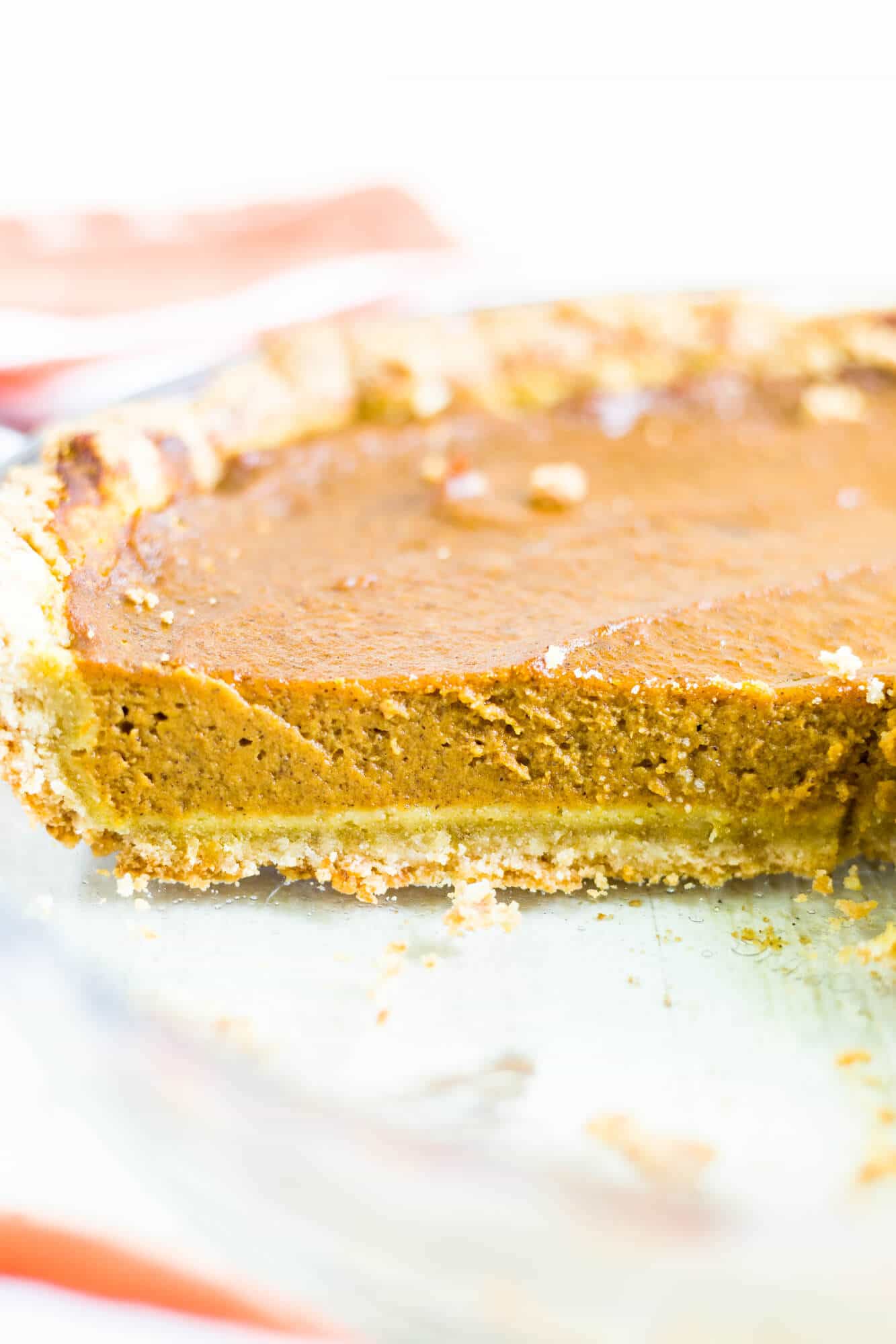 dairy free pumpkin pie recipe slice in the pie dish