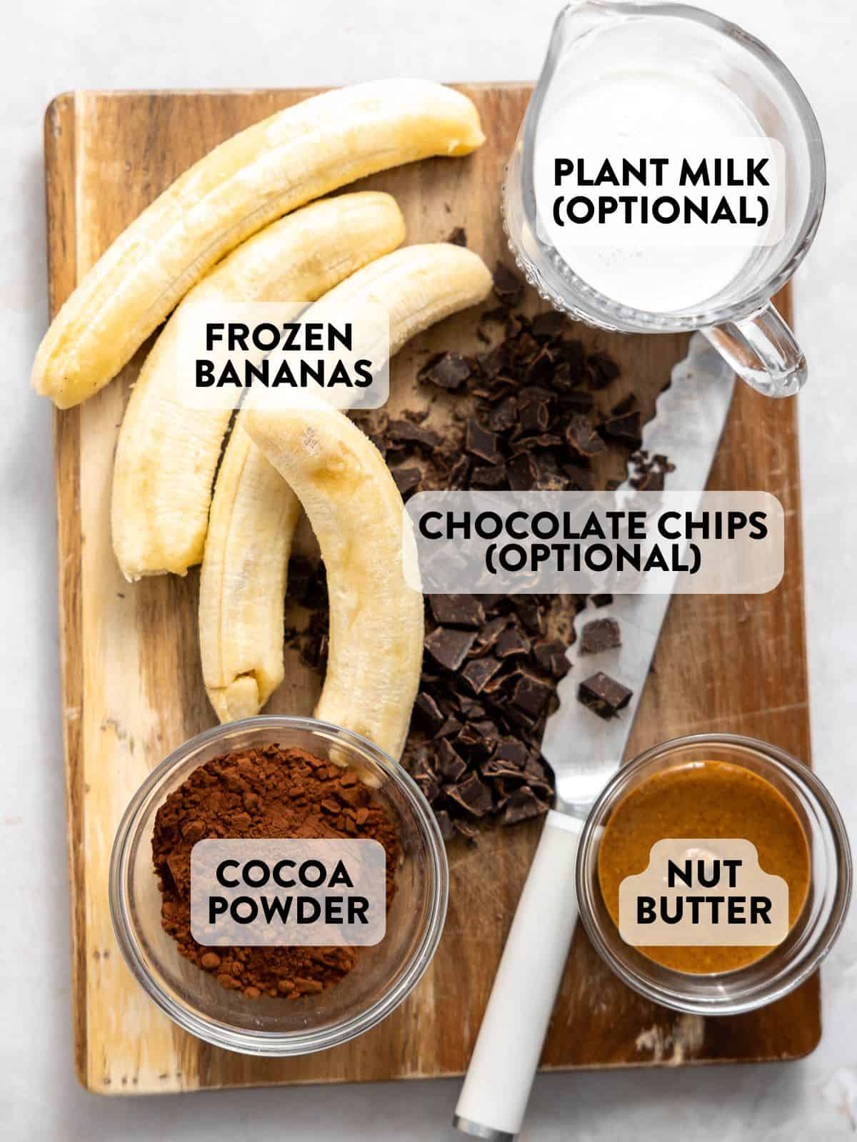 ingredients for vegan chocolate banana ice cream on a counter.