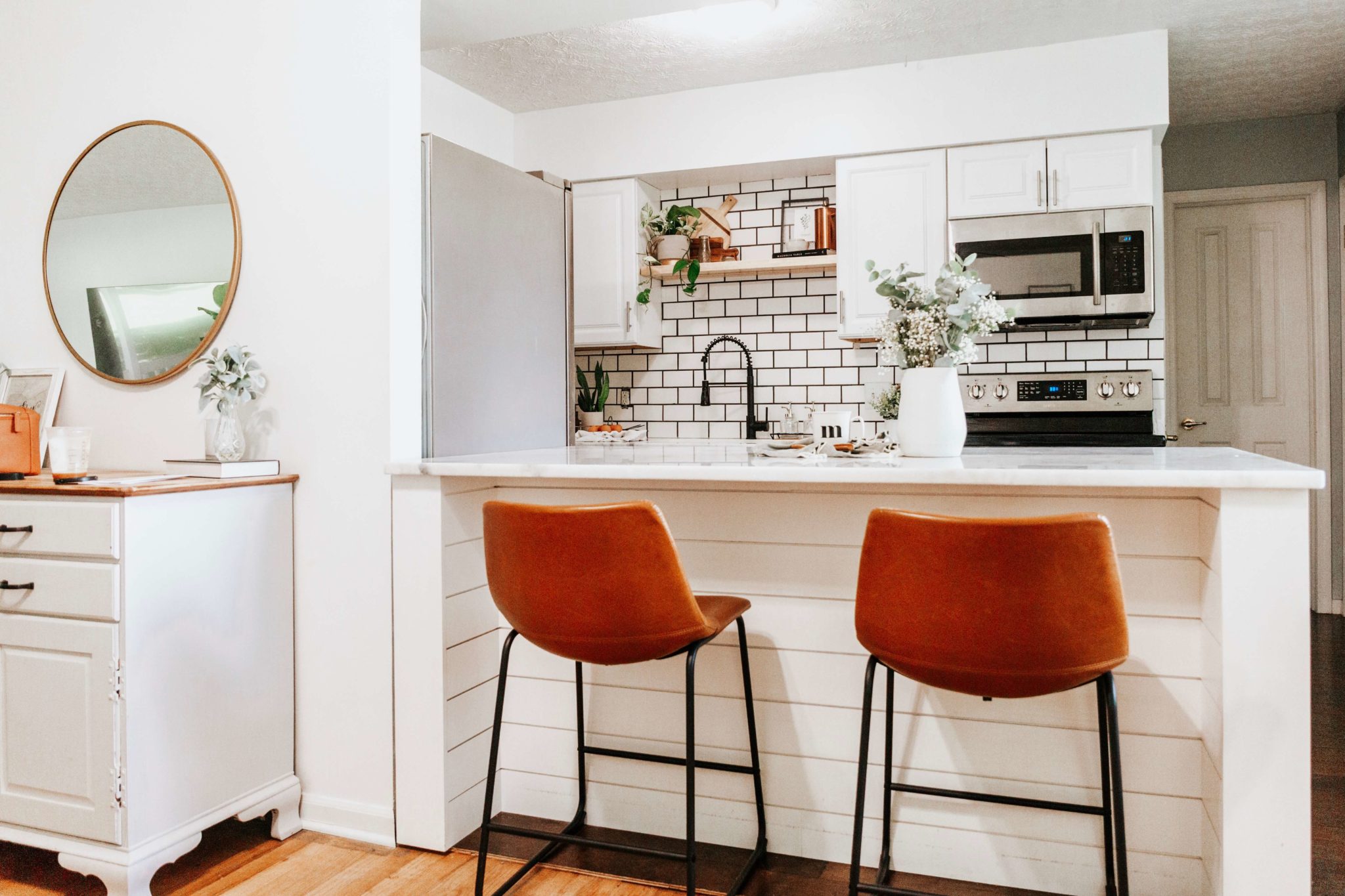 modern farmhouse shiplap kitchen island with leather stools