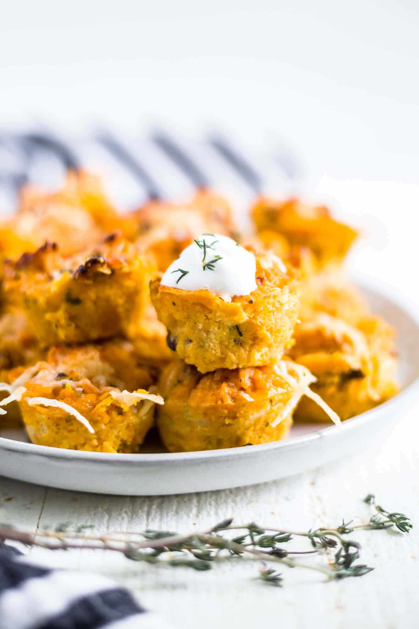 sweet potato puffs on a white serving plate