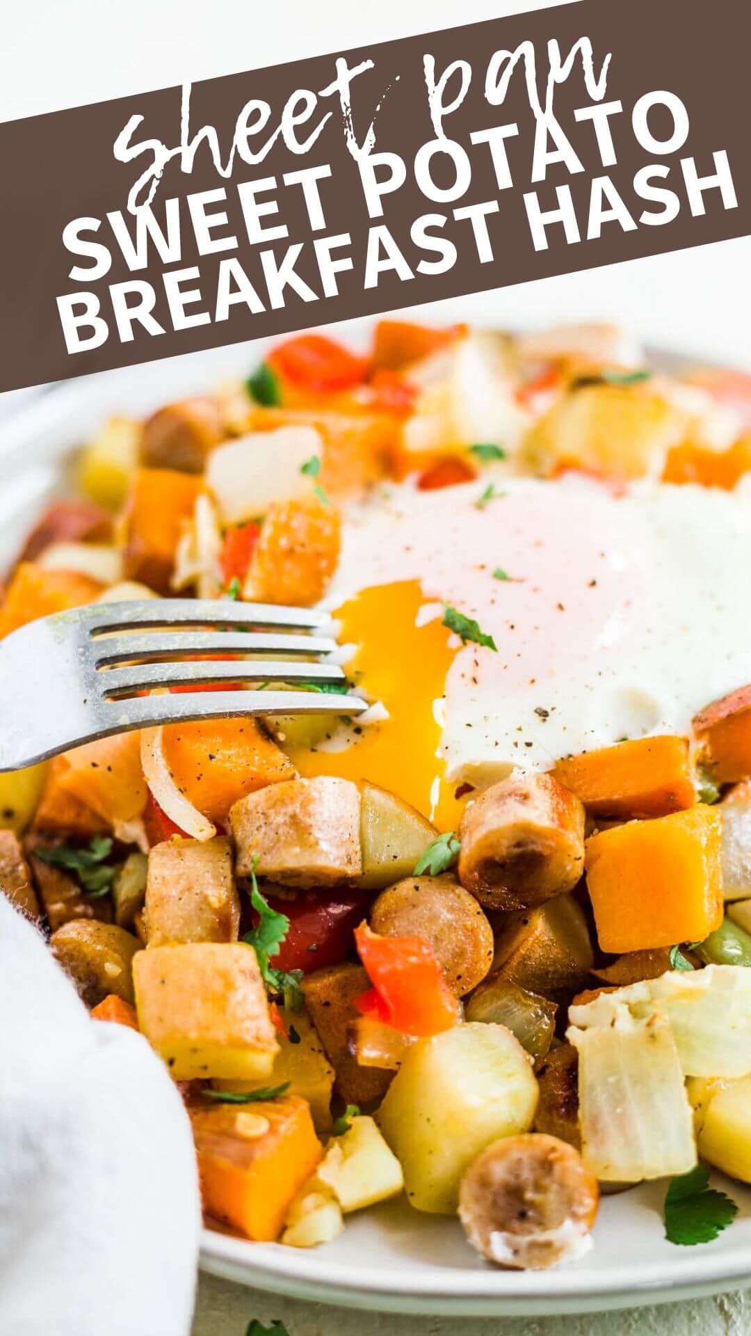 fork digging into sheet pan sweet potato breakfast