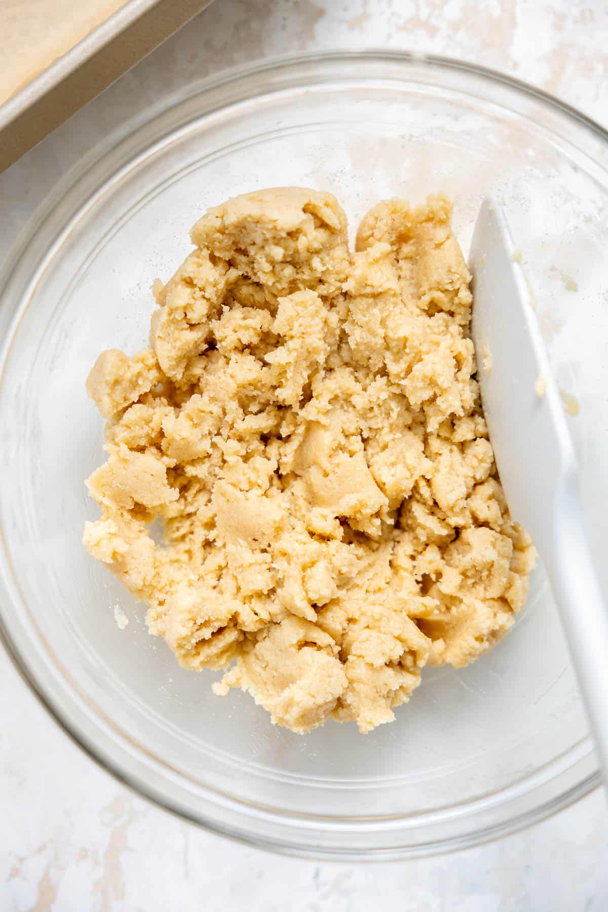 healthy shortbread crust in a mixing bowl.