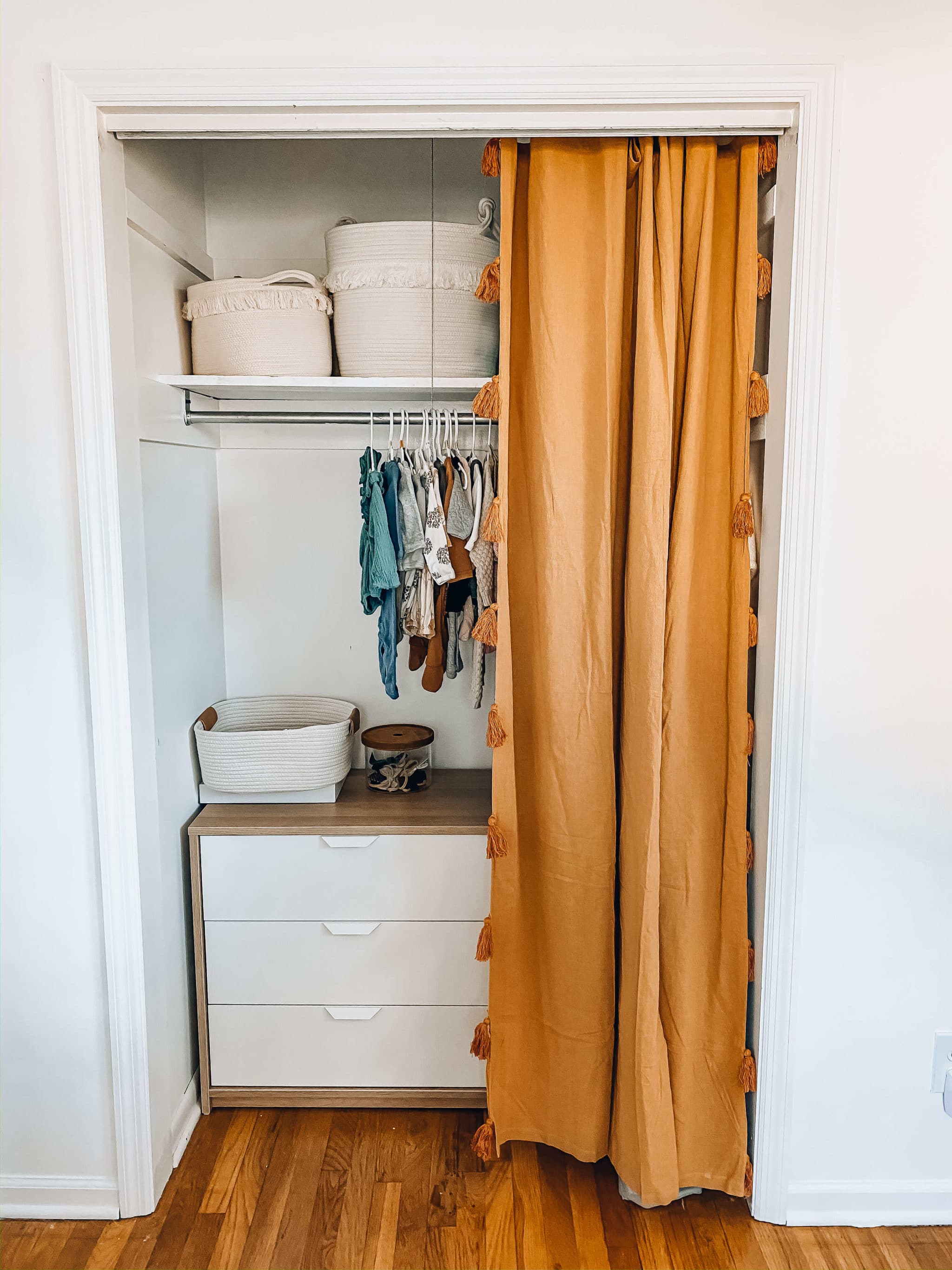 neutral boho nursery closet organization