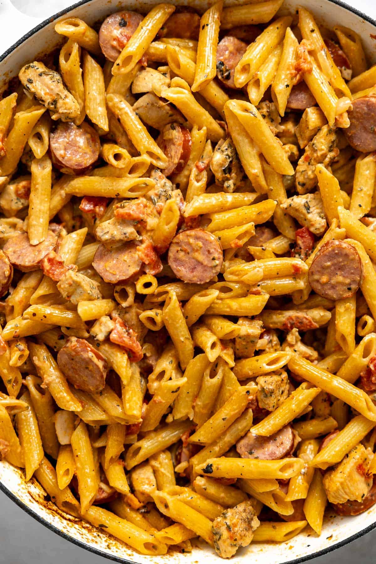 one pot cajun chicken sausage pasta in a skillet.