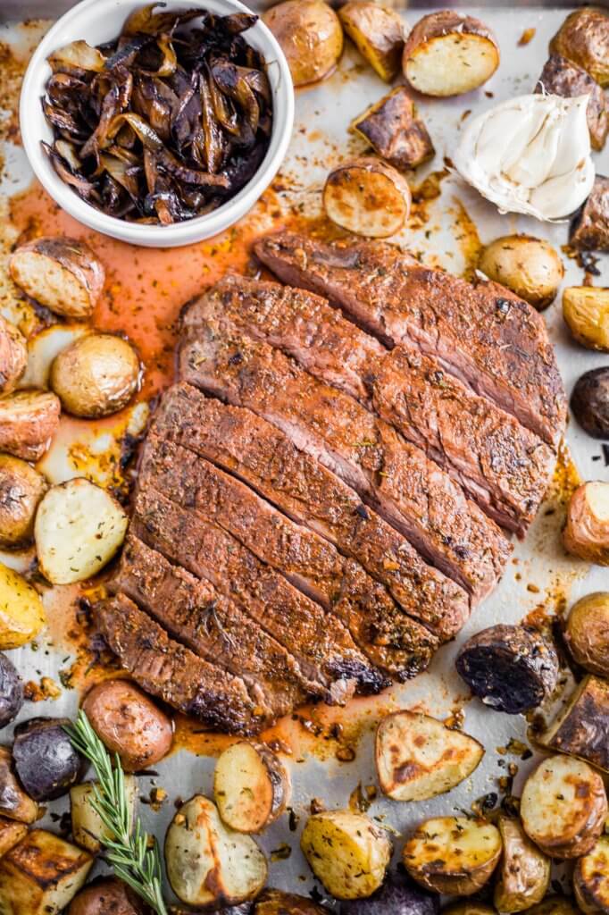 spice rubbed flank steak in the oven with baby potatoes