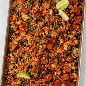 Sheet pan mexican chicken, rice, and beans with fresh lime and cilantro