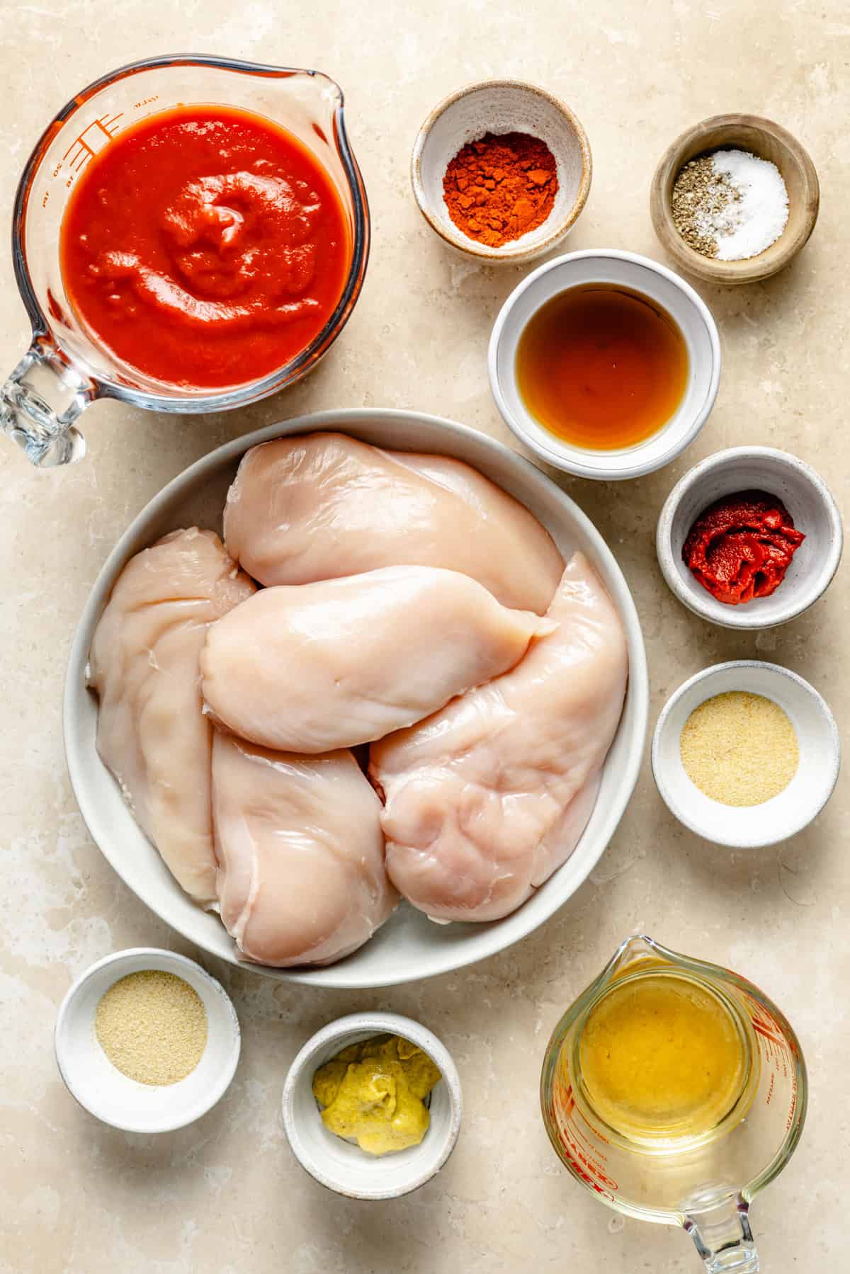 ingredients for bbq chicken on a counter.