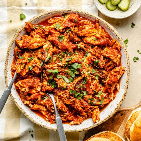 slow cooker bbq chicken in a serving bowl.