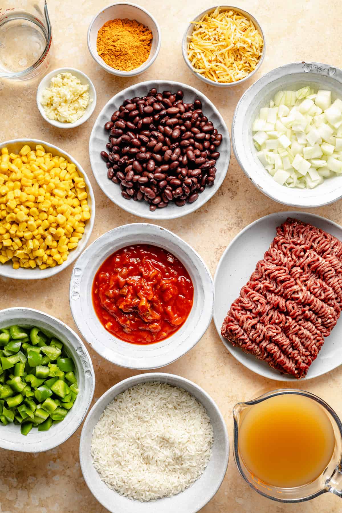 ingredients for mexican beef and rice skillet on a counter.