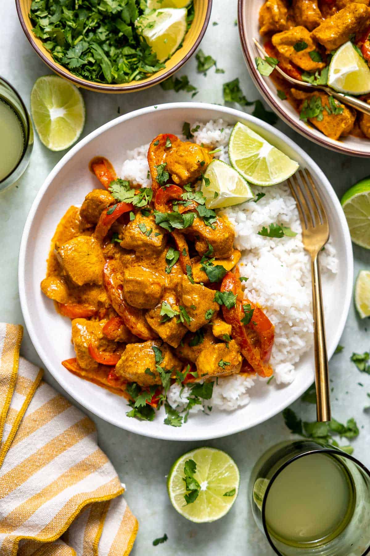 coconut curry chicken in a bowl with basmati rice.